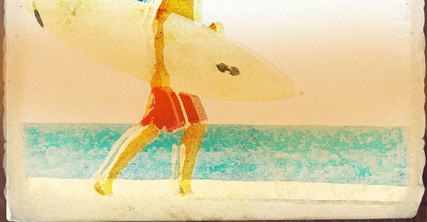 worn vintage beach ad in photoshop