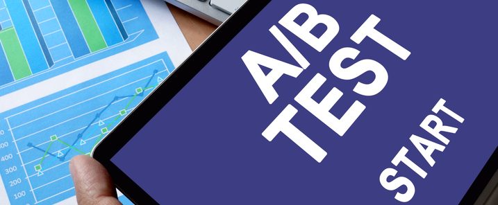 Notepad in hands with message A/B test.