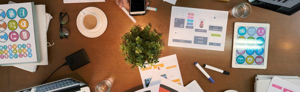 Developers and investors working on interface for new mobile application
