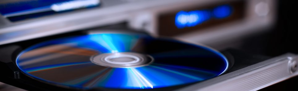 DVD disc inserting to player