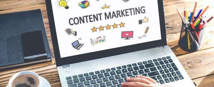 Content Marketing Concept With Various Hand Drawn Doodle Icons On Laptop Monitor