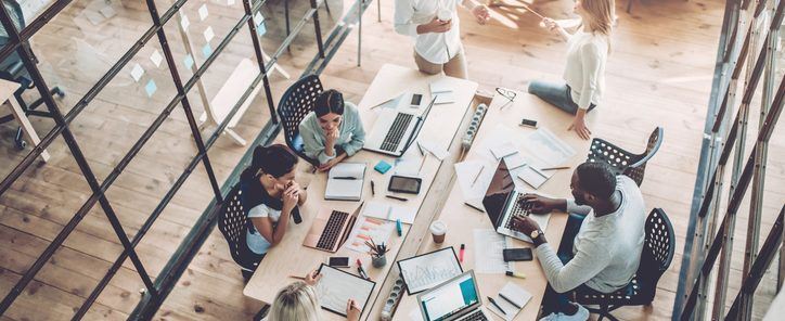 Young people work in modern office.