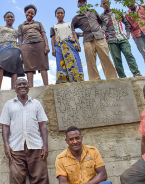 community members with sand dam