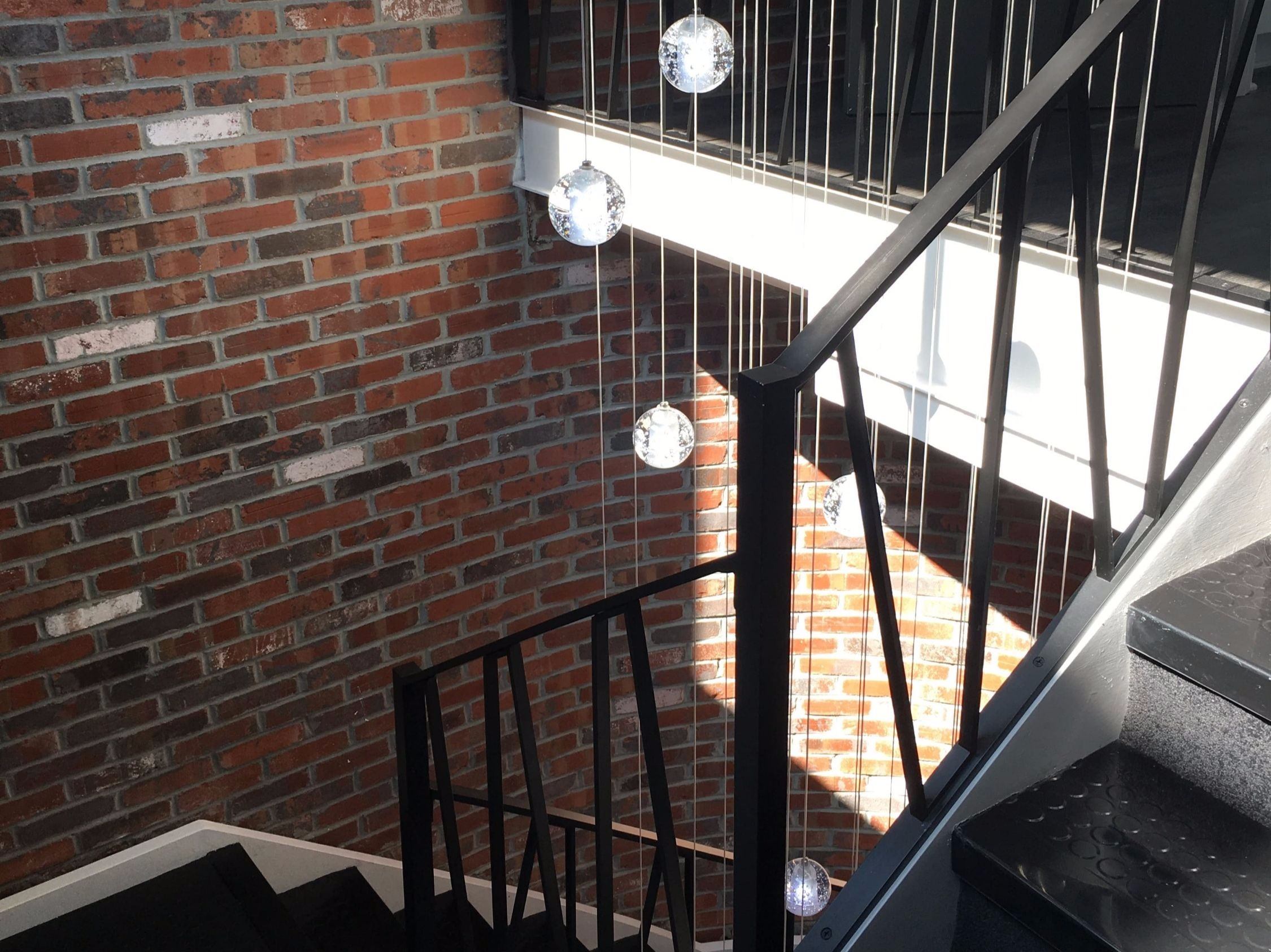 Brick stairwell with lights