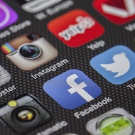 facebook and twitter logos on screen