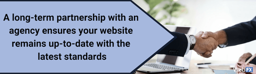 A handshake between a web design agency and new client