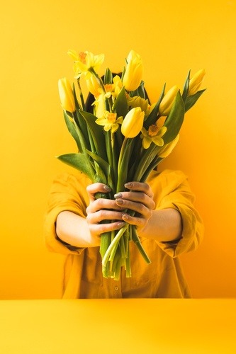 girl holding flowers