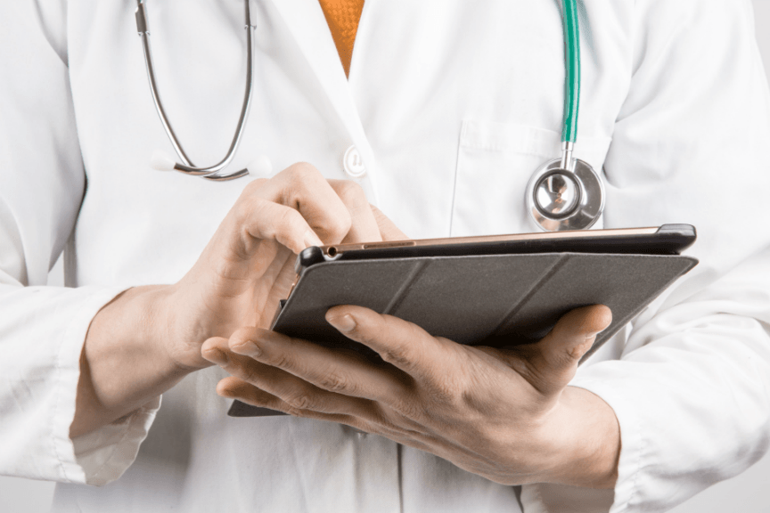 Doctor holding an iPad