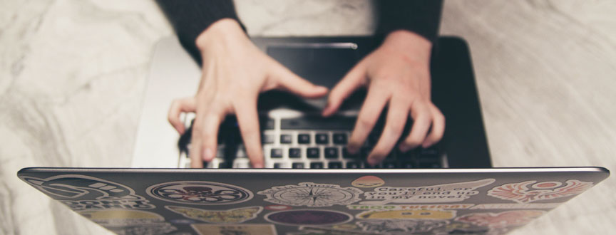 typing on laptop