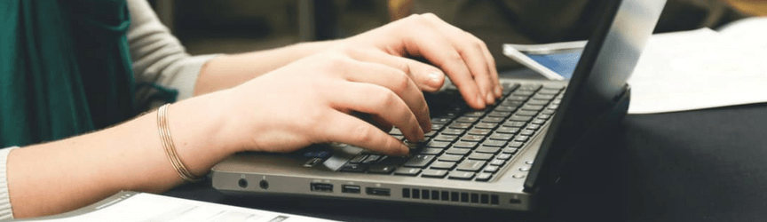 typing on a laptop