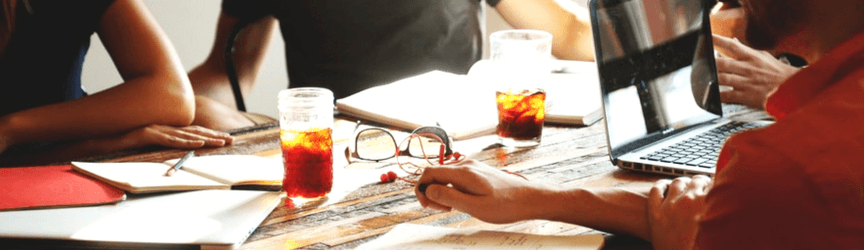group of people working at a table