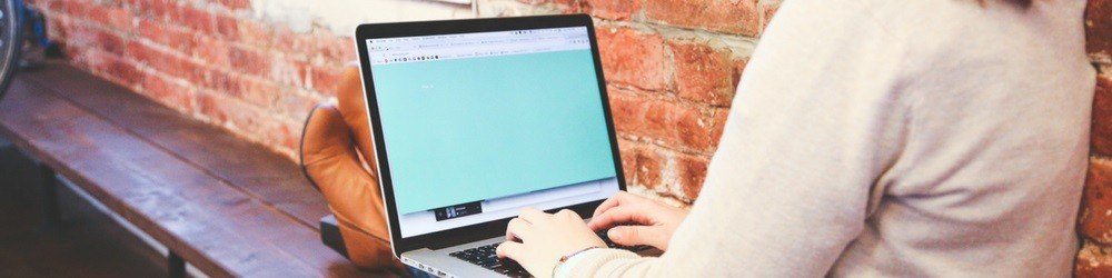 woman sitting at computer