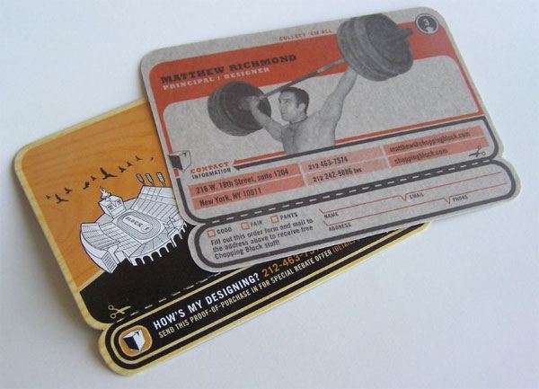 Two creatively designed business cards, with the top card featuring a man lifting weights and contact information for a Principal Designer named Matthew Richmond, and the bottom card displaying a wooden texture with a ship and birds silhouette.