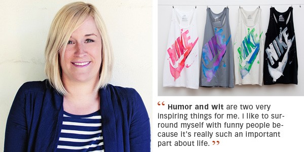 A smiling woman with blonde hair wearing a blue cardigan, next to four hanging tank tops with colorful paint splatter designs and the Nike logo. A quote about the importance of humor and wit in life is included below the image.