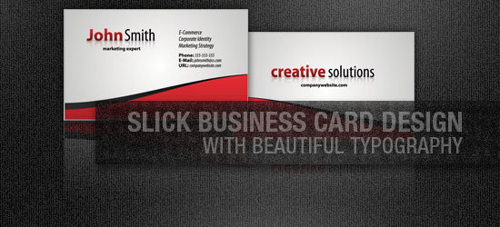 Two business cards with a modern design, one with a dark background and red accents featuring the name 'John Smith' and contact information, and the other with a white background and the text 'creative solutions' along with a website URL.