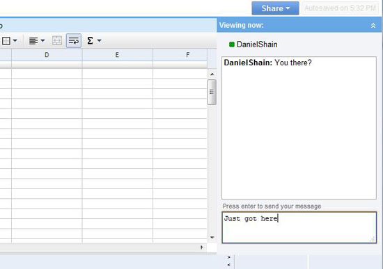 Screenshot of an open spreadsheet application with an overlay chat window. A user named DanielShain has asked 'You there?' and a reply is being typed that says 'Just got here!'.