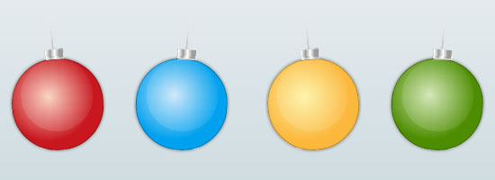 Four Christmas ornaments in red, blue, yellow, and green colors with shiny caps, aligned in a row on a light background.