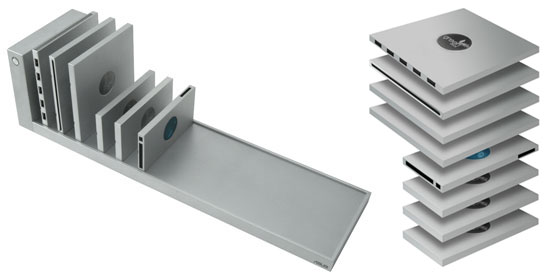 Exploded view of a modular stackable hard drive system with multiple units designed to stack on a flat base.