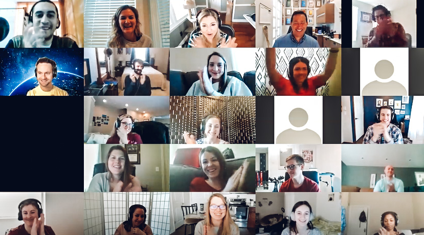 A screenshot of a virtual meeting with 18 participants, most of whom are smiling and waving at the camera. Various indoor backgrounds are visible, and one feed shows a space-themed backdrop. One participant's feed is replaced by a placeholder icon.