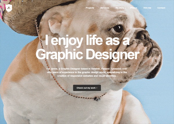 A bulldog wearing a straw hat and a gold chain necklace with text overlay stating 'I enjoy life as a Graphic Designer' and a brief professional introduction, part of a graphic design portfolio website.