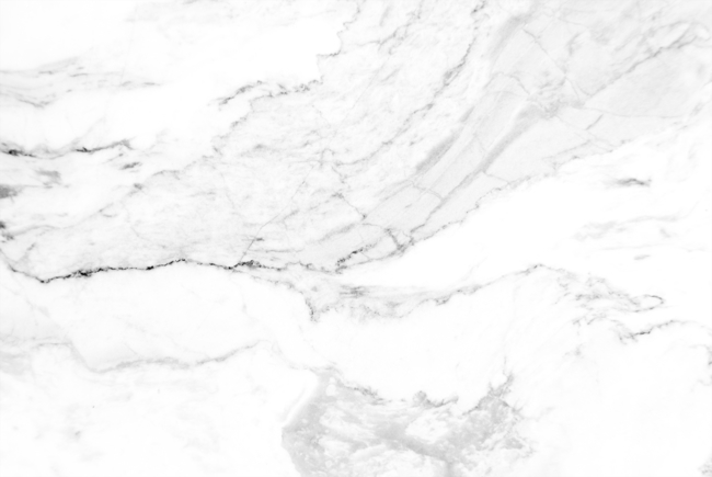 Close-up of white marble texture with grey veins.