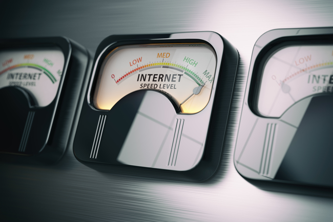 Three analog-style gauges indicating internet speed levels, with the central gauge needle pointing towards the high end of the scale.