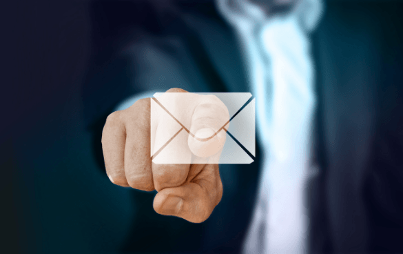 a man points to a floating transparent envelope