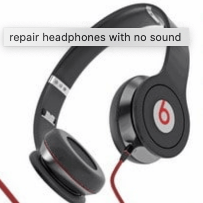 Example of an un-optimized image of headphones, that is blurry and has text over it.