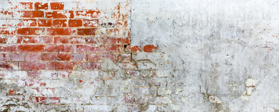 Vintage brick rough rustic wall with cracked plaster. Grunge Red white stonewall background.