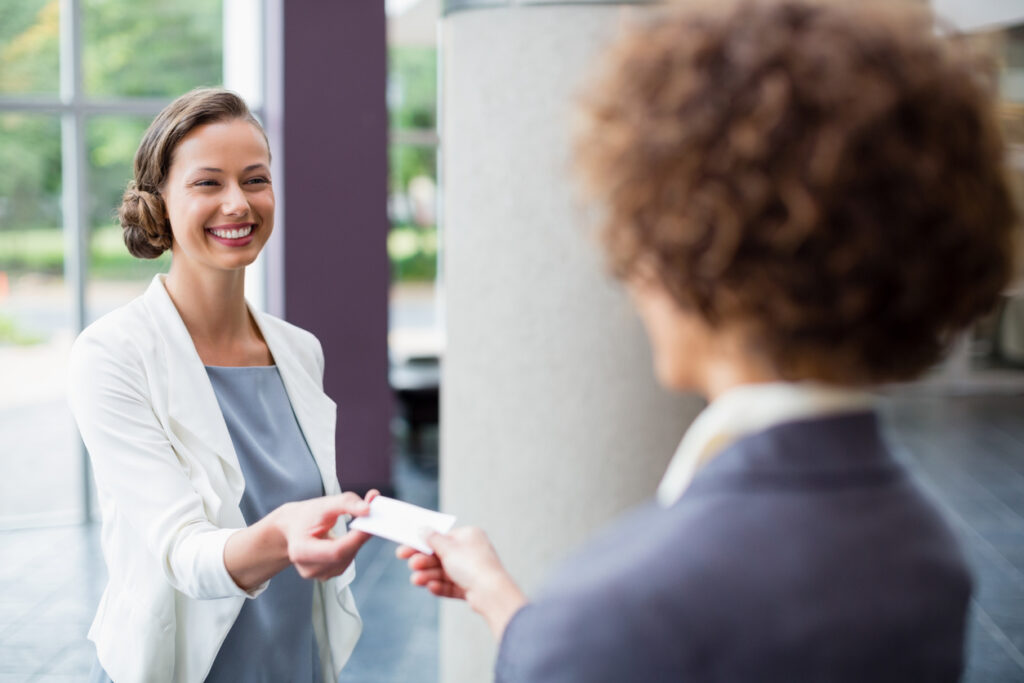 Business executives exchanging business card