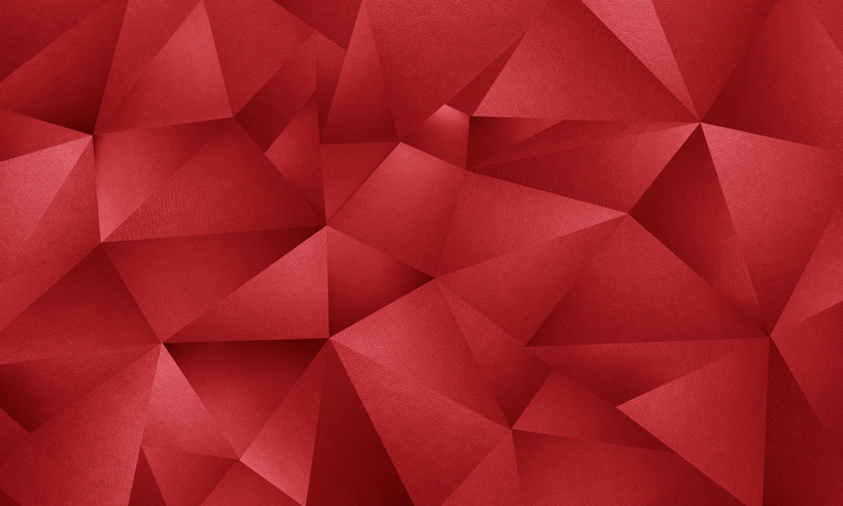 red abstract background made of geometric triangle shapes in a random mosaic, origami style composed of authentic photographs of textured art paper to give genuine texture