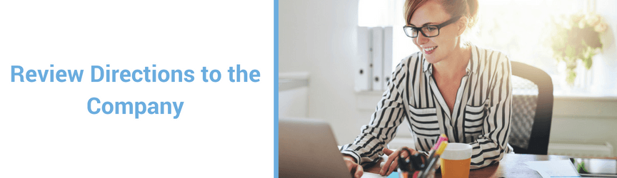 A woman researches careers on her laptop.