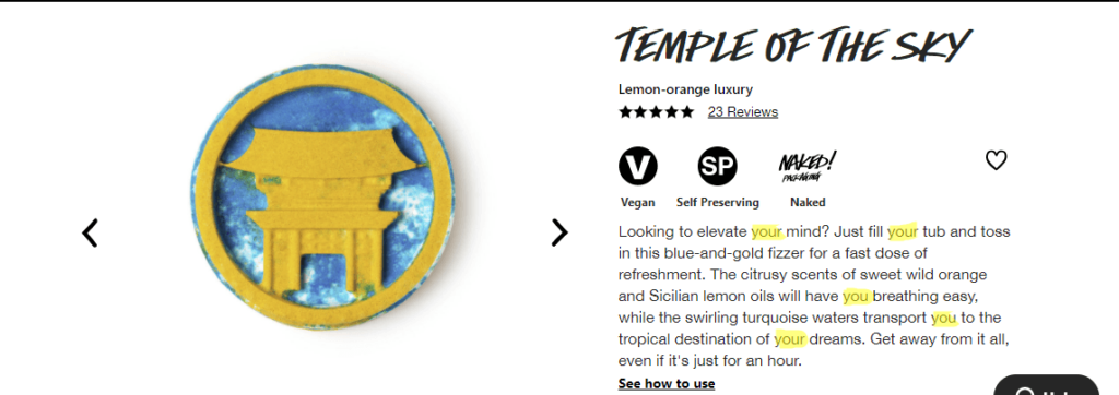 A blue and gold bath bomb with a temple silhouette design, indicating a vegan, self-preserving, and packaging-free product called 'TEMPLE OF THE SKY' with a five-star rating from 23 reviews.