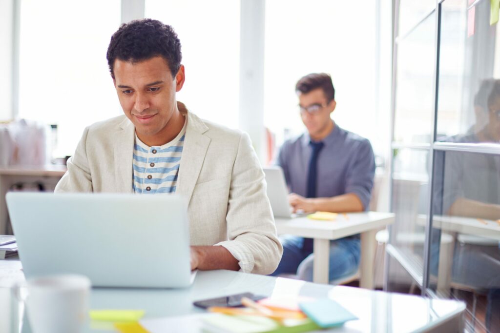 Two men working in an office