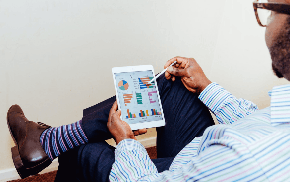 person reading charts on tablet