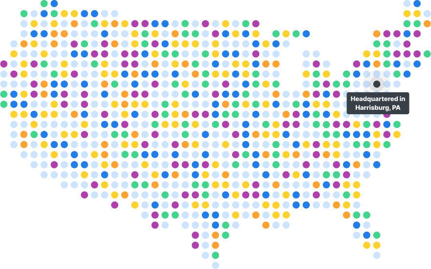 Stylized dot map of the United States with multicolored dots representing states and a label indicating something is headquartered in Harrisburg, Pennsylvania.