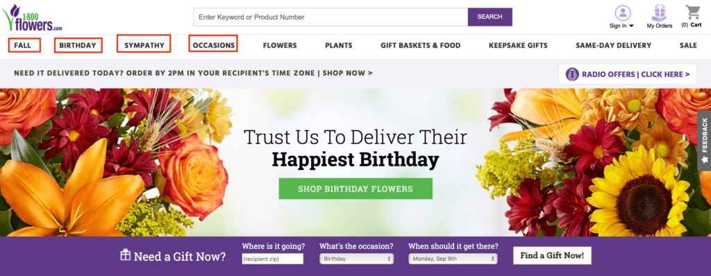 Screenshot of 1-800-Flowers.com homepage featuring navigation options, a search bar, and a colorful fall-themed floral arrangement with a message encouraging users to shop for birthday flowers, along with fields to specify delivery details.