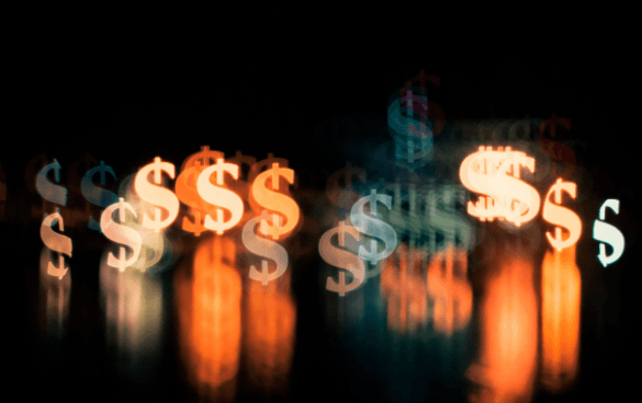 Abstract artistic representation of multiple out-of-focus dollar sign symbols with glowing reflections.