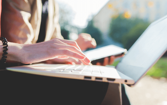 Person typing on a laptop