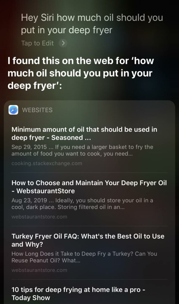 Screenshot of a voice assistant interface showing search results for the query about the amount of oil to use in a deep fryer.