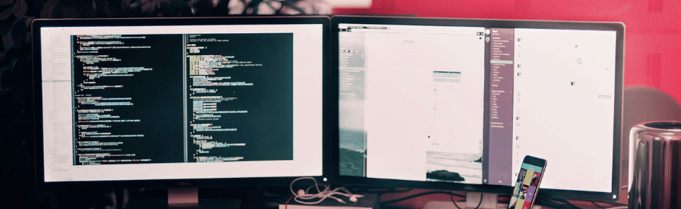 A monitor with a web design on the screen