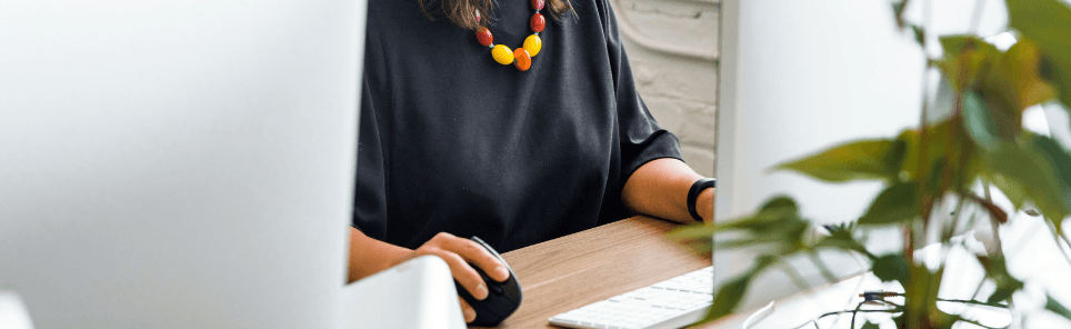 A woman working on SEO services for a client