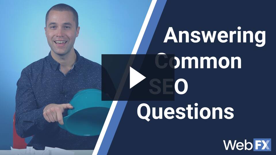 A smiling person holding a blue frying pan in front of a presentation titled 'Answering Common SEO Questions' by WebFX.