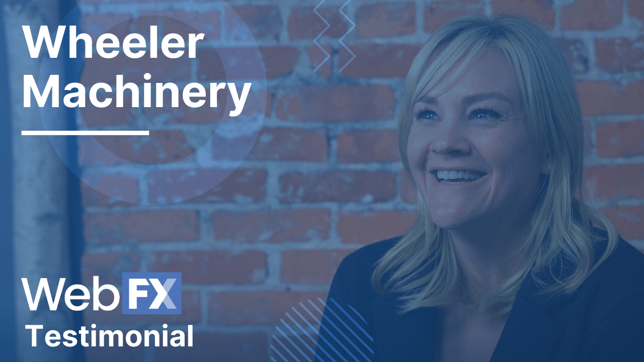 Smiling woman with overlay text 'Wheeler Machinery' and 'Web FX Testimonial' in front of a brick wall with graphic design elements.