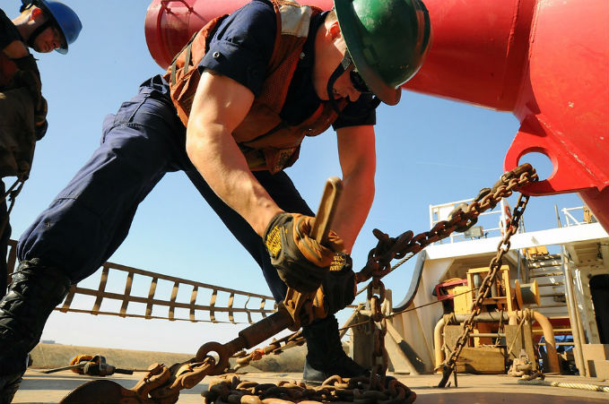 workers with heavy equipment