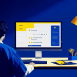 Blue and yellow: Person at desk with computer