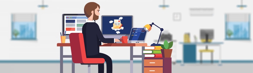 guy on computer at desk