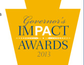 Logo of the Governor's Impact Awards 2013 featuring a yellow star with a blue ribbon across it containing the text 'Governor's IMPACT AWARDS 2013'.