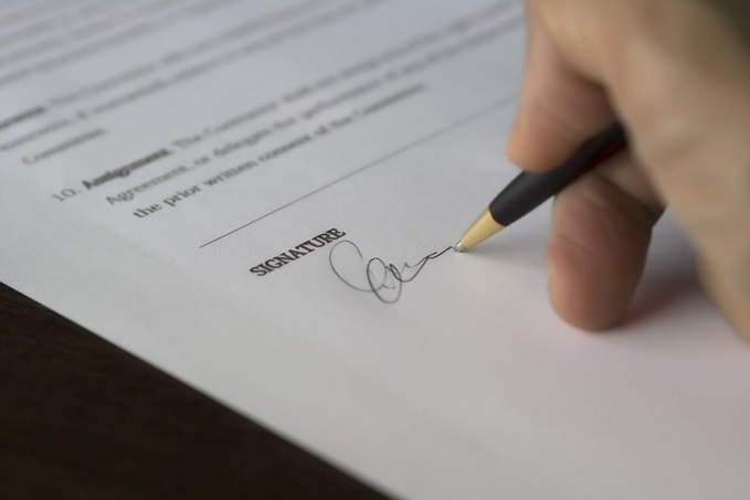 person signing document