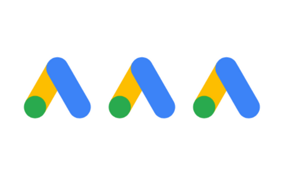 Three identical abstract symbols in a row, each with a blue arch, green circle, and yellow triangle.